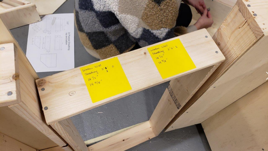 Brooklyn, NY Pratt Architecture students building a HALF-Full-Scale mock-up of their MODULAR design and build system  To be assemblable and dis-assemblable and for ease of transportation and re-use by others for educational purposes…